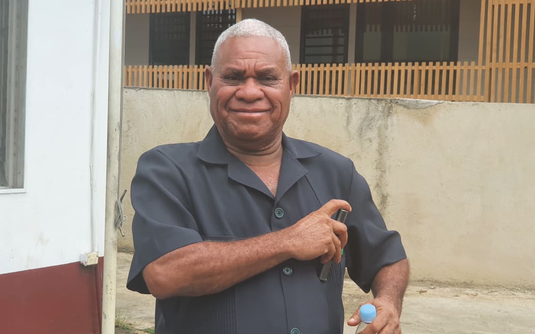 Vanuatu PM, Bob Loughman, outside the courthouse