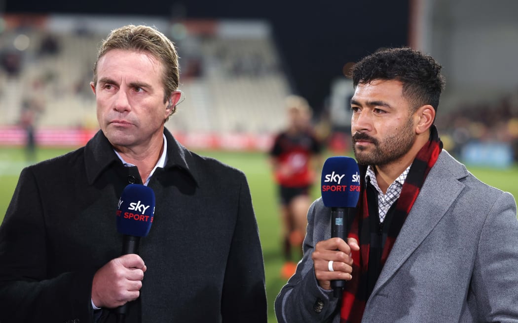 Former All Black turned rugby commentator Justin Marshall with All Black Richie Mo'unga during the Super Rugby season.