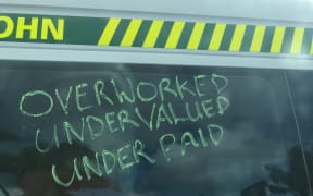 A message on the side of a St John Ambulance in Auckland.