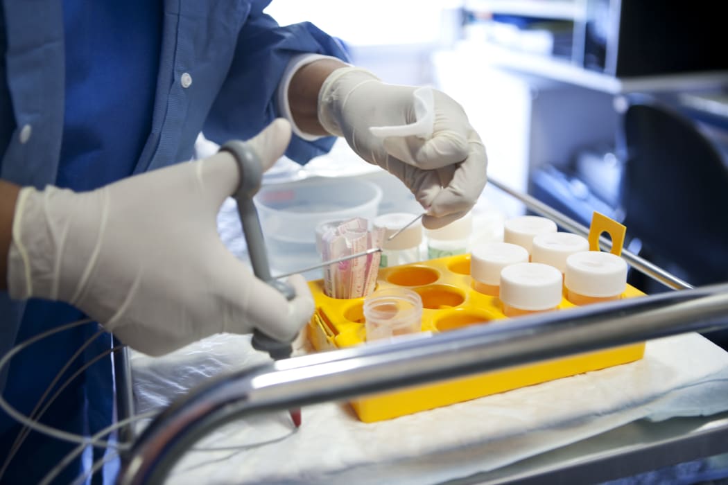 Samples of a colon biopsy to be sent to a laboratory, at Diaconesses Croix Saint-Simon Hospital, Paris, France (2009).