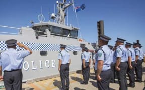 Members of the Tuvalu Police Force at the handover ceremony of Te Mataili II (a patrol boat gifted by Australia).
