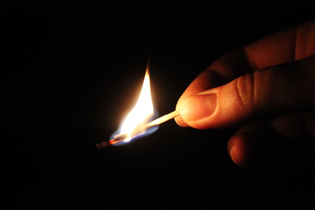 Burning match