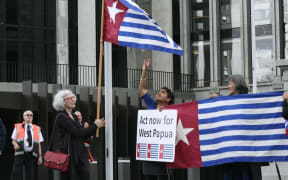 New Zealand MPs participate in a West Papua flag raising event in front of parliament.