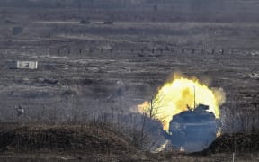 A Ukrainian Army T-64 tank firing during a military drill outside the city of Rivne, northern Ukraine, on February 16, 2022.