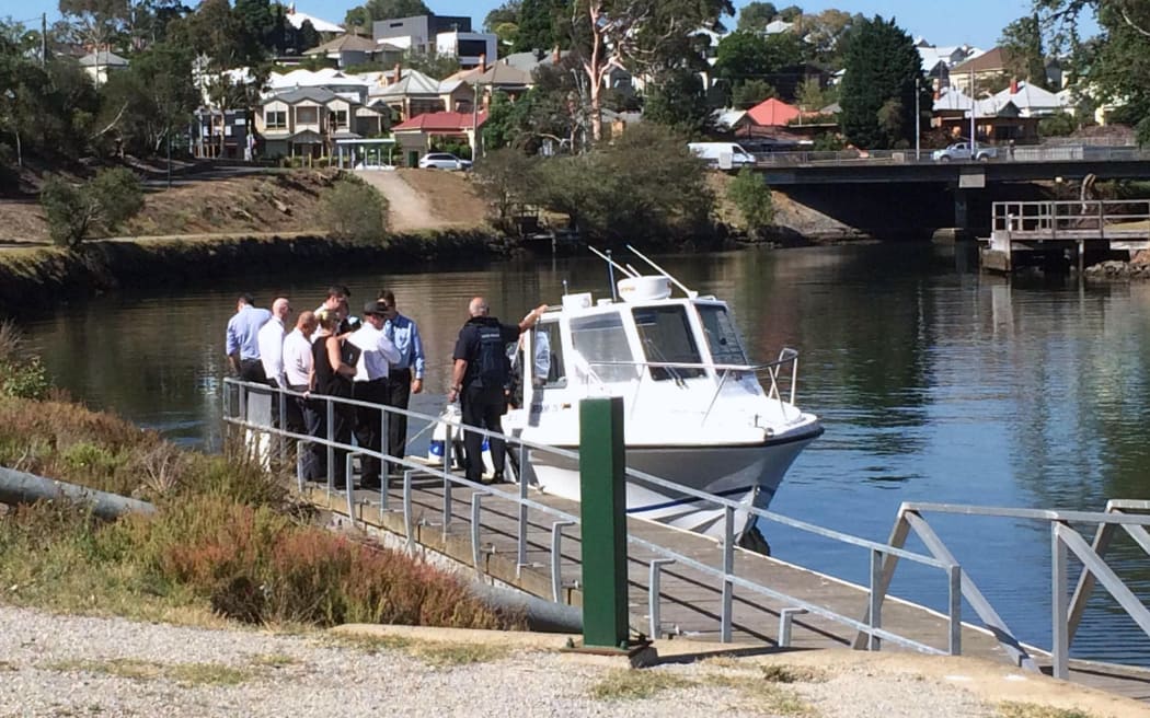 Detectives searching for body parts in a Melbourne river on Friday after a severed arm was found.