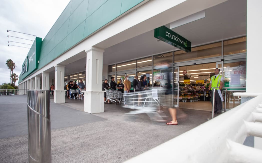 People queue up to shop at Mount Wellington, Auckland.