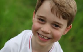 Prince George, in the garden of Kensington Palace, in a photo taken by the Duchess of Cambridge to mark the prince's sixth birthday.