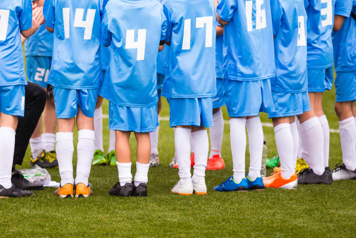 Football match for children. shout team, football soccer game. team work