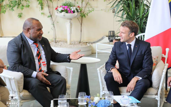 PNG Prime Minister James Marape, left, and French President Emmanuel Macron.