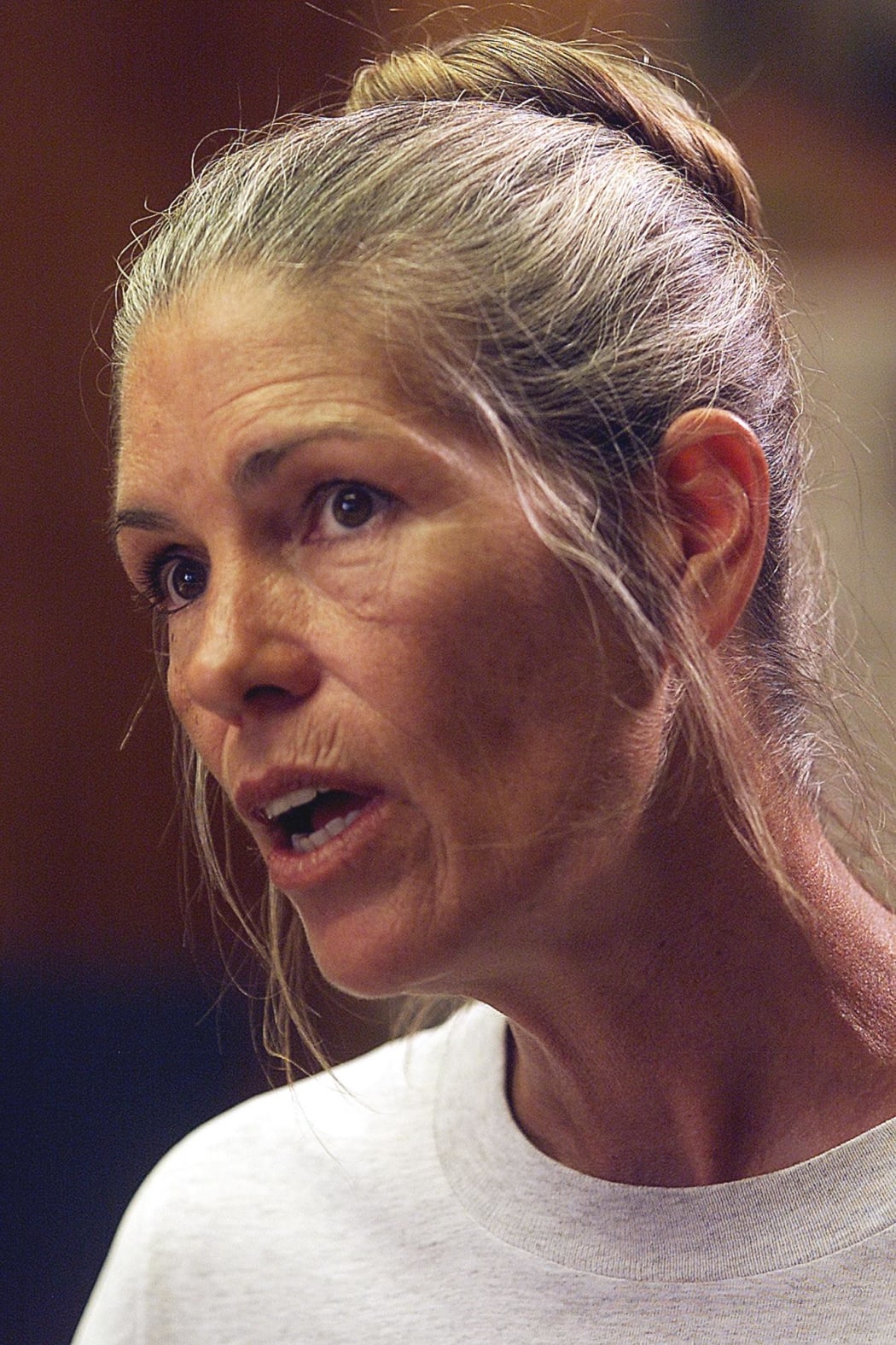Leslie Van Houten expresses remorse in the killings of the LaBianca couple to members of the Board of Prison Terms commissioners during her parole hearing 28 June 2002.