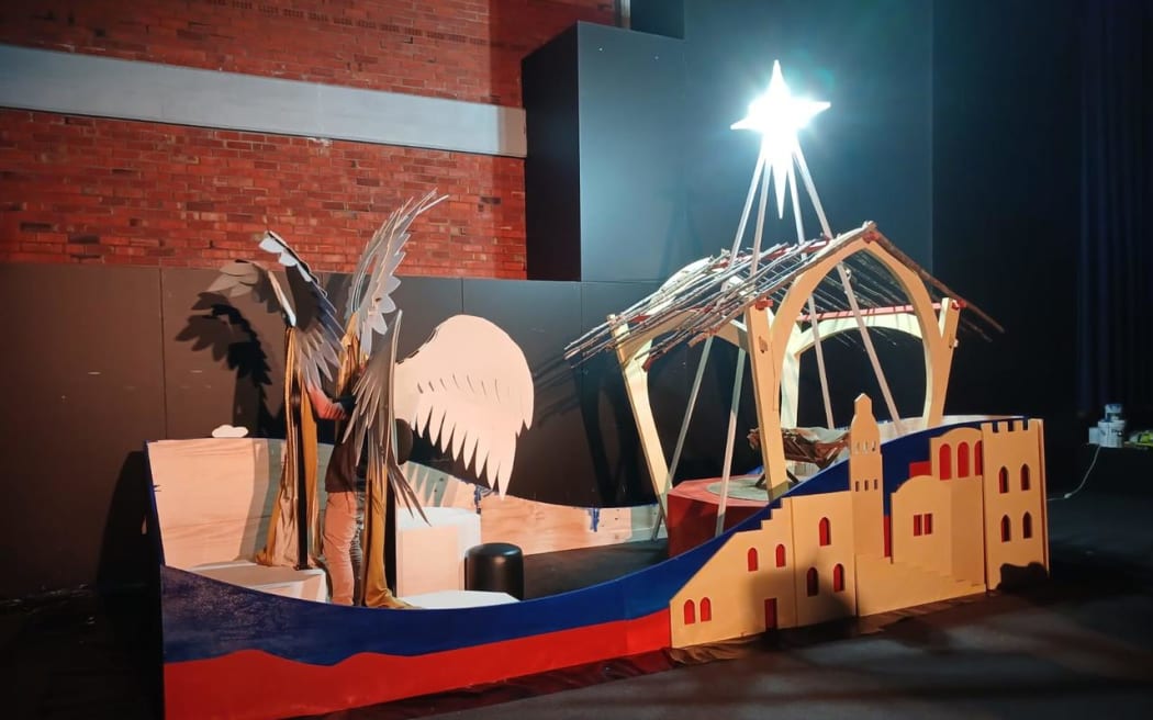 Picture shows a float depicting nativity being built.