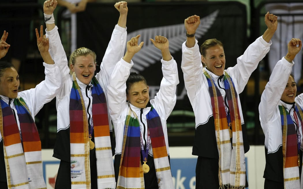 Temepara Bailey and Northern Stars teammate Leana de Bruin celebrating a gold medal at the 2010 Commonwealth Games