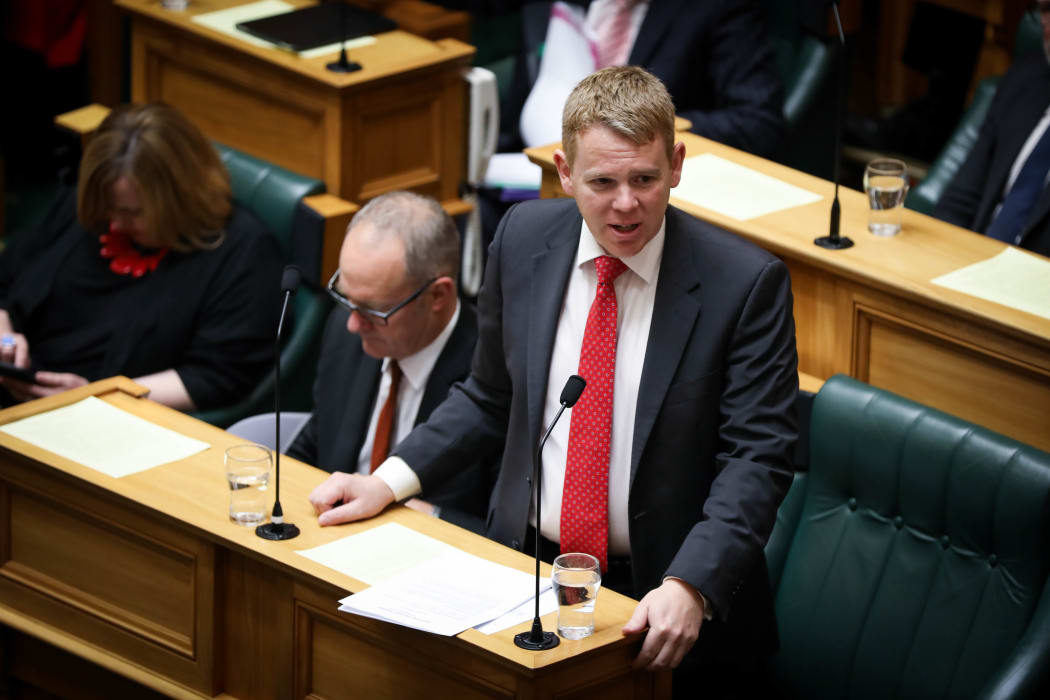 Minister of Education Chris Hipkins answers questions in the debating chamber.