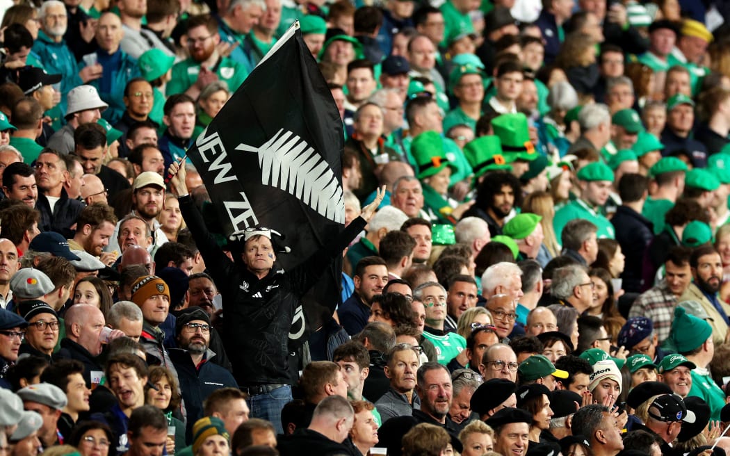 A fan of New Zealand shows their support amongst the crowd prior to the Rugby World Cup France 2023 quarter-final match between Ireland and New Zealand at Stade de France on 14 October, 2023 in Paris, France.