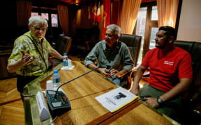 Bruno Barillot, (left), talks to Roland Oldham, president of Moruroa e Tatou and Father Auguste Uebe-Carlson, president of 193 anti-nuclear association.
