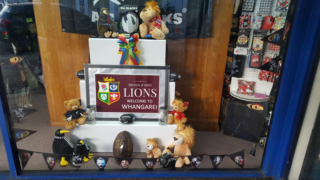 Whangārei puts out the welcome mat for the Lions: display in Rathbone Gifts window.