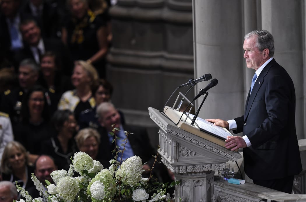 Former US President George W. Bush speaks during a memorial service for US Senator John McCain at the Washington National Cathedral in Washington, DC.