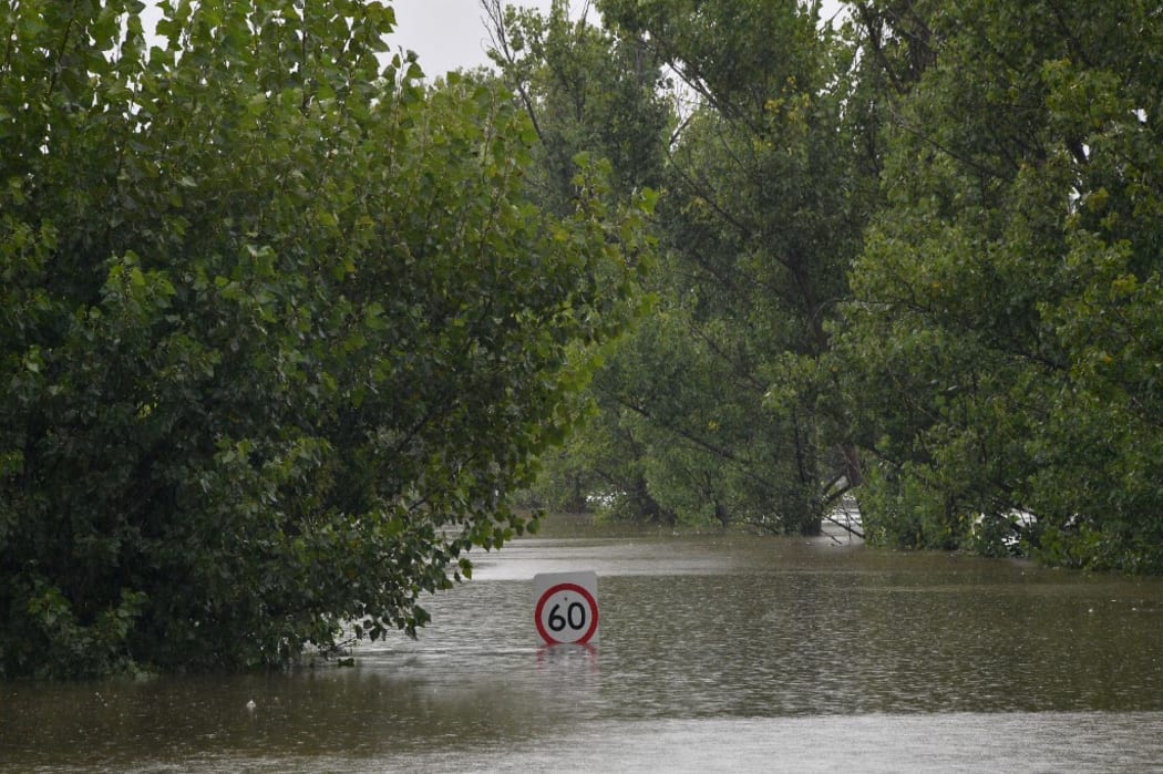 A general view of a main road under floodwaters in Richmond suburb on March 22, 2021, as Sydney braced for its worst flooding in decades after record rainfall caused its largest dam to overflow.