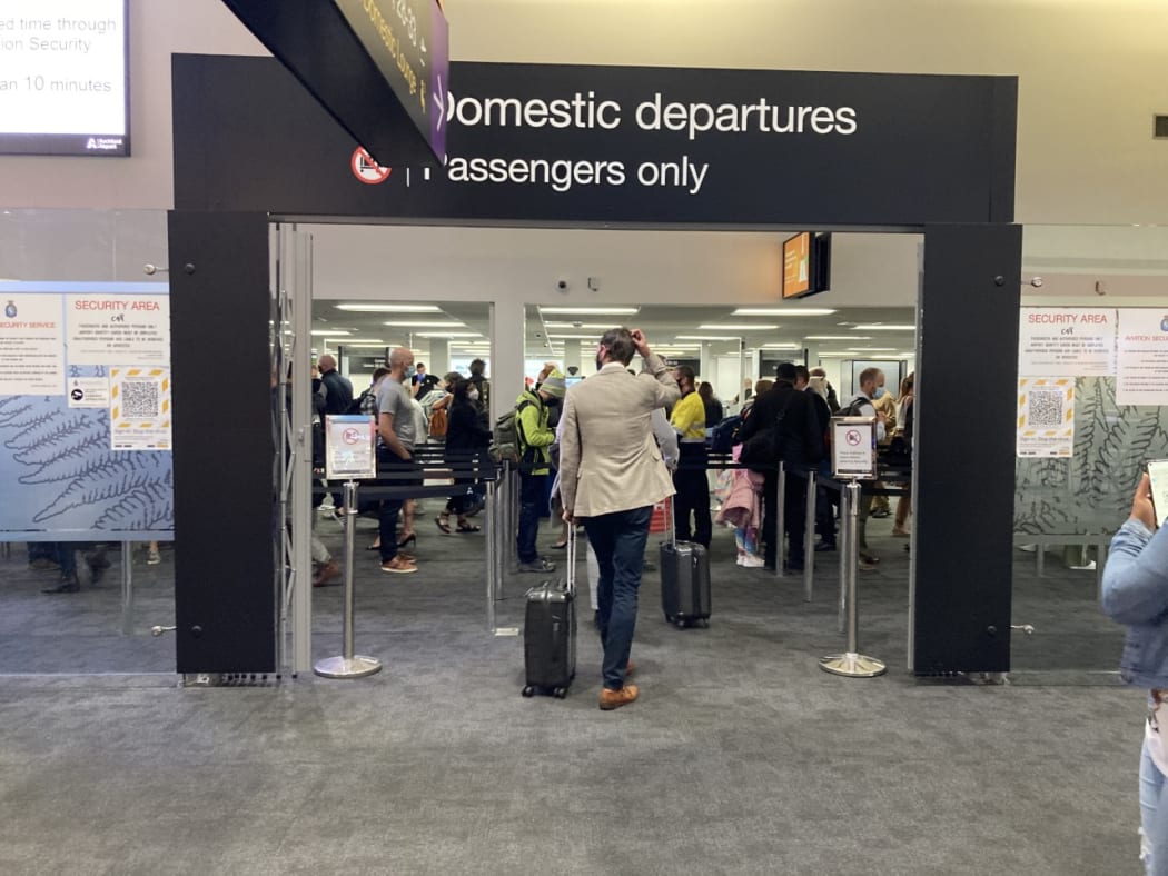 Passengers at Auckland Aiport as the Tāmaki Makaurau border reopens on Wednesday 15 December.