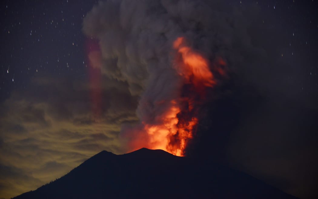 Mount Agung erupts at night.