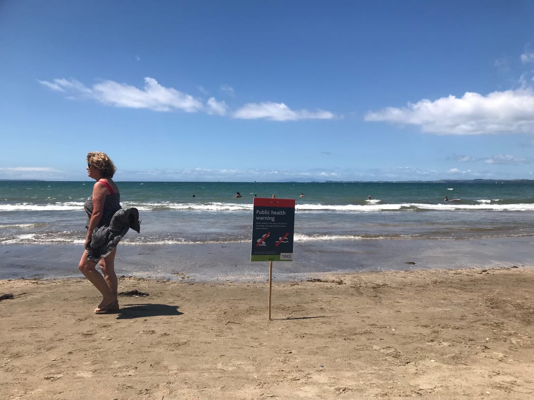 A sign warning swimmers at Milford beach.