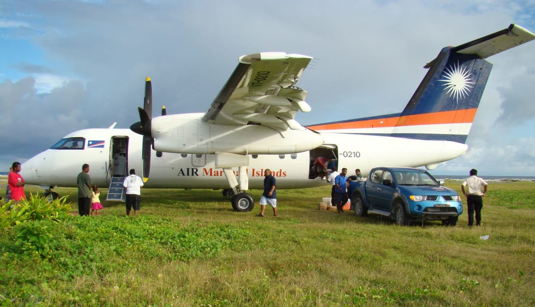 Air Marshall Islands, the country's national air carrier, is one of a 11 state owned enterprises that as a group have performed poorly and required government subsidy for decades. Air Marshall Islands' Dash-8 aircraft (pictured) off loading passengers and freight at Jaluit Atoll.