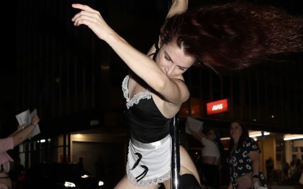 A performer at the 18 February 2023 protest by New Zealand tripper's advocacy group Fired Up Stilettos.