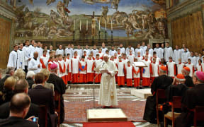 Pope Benedict XVI attends a concert by the Regensburger Domspatzen boys choir at the Sistine Chapel in the Vatican in 2005.