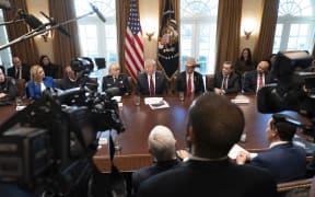 US President Donald Trump participates in a roundtable discussion on border security and safe communities at the White House on Friday.