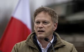Britain's Secretary of Defense Grant Shapps speaks during a join press conference with Polish Defence Minister after their meeting on a military training compound next to Orzysz, North-Eastern Poland, on March 13, 2024. Britain's Secretary of Defense Grant Shapps visits the NATO-organized Steadfast Defender 2024 military exercise in Poland. (Photo by Wojtek Radwanski / AFP)