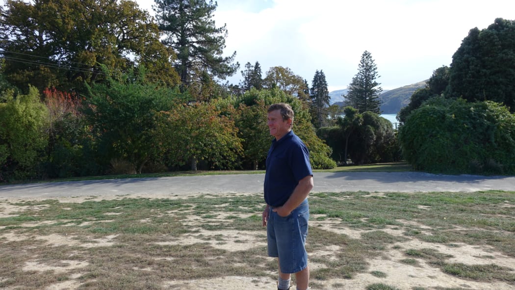 Alan Bradford of the Akaroa Health Hub Structure Group checks out the view at the site of the former Akaroa Hospital, and the future site of the new health facility.