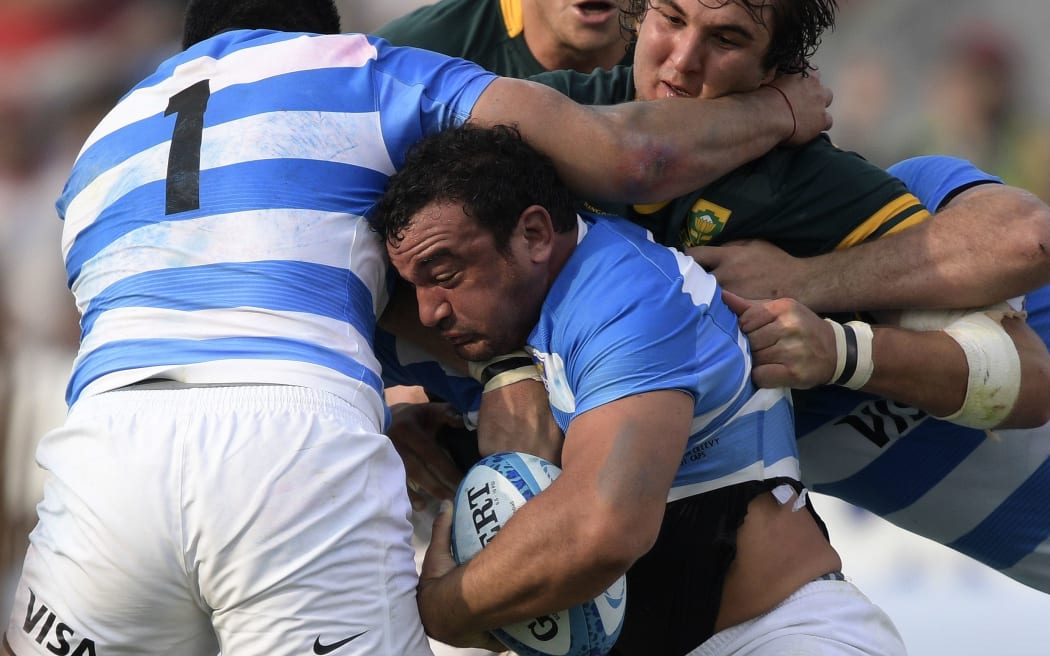 Argentina No.8 Facundo Isa in action in their Rugby Championship match at Padre Ernesto Martearena stadium in Salta, August 27, 2016. 
JUAN MABROMATA / AFP