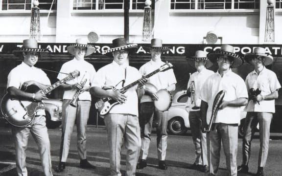 Nick Nicholson and the Neketini Brass outside the Christchurch NZBC studio, 1968.