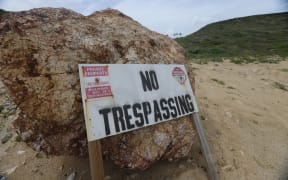 This undated handout photo from the US Virgin Islands Attorney General's office released on December 3, 2025, by US Representative Robert Garcia, Ranking Member of the Committee on Oversight and Government Reform, shows a "no trespassing" sign near Jeffrey Epstein's home on his private island, Little St. James Island, US Virgin Islands. (Photo by HANDOUT / US Virgin Islands Attorney General's Office / AFP) / RESTRICTED TO EDITORIAL USE - MANDATORY CREDIT "AFP PHOTO /  US VIRGIN ISLANDS ATTORNEY GENERAL'S OFFICE / HANDOUT" - HANDOUT - NO MARKETING NO ADVERTISING CAMPAIGNS - DISTRIBUTED AS A SERVICE TO CLIENTS