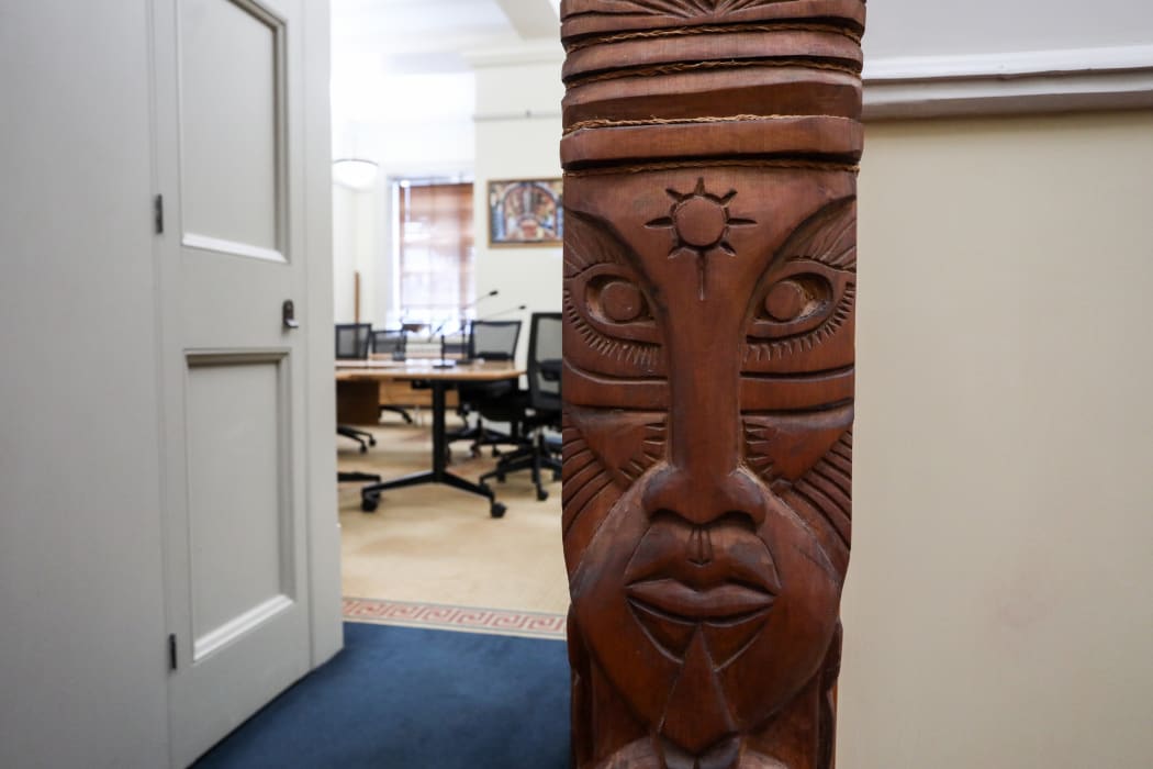 One of the four carved totems that guard the entrance to Parliament's Pasifika Select Committee Room