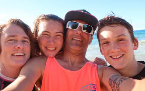 Mike Leach and his family