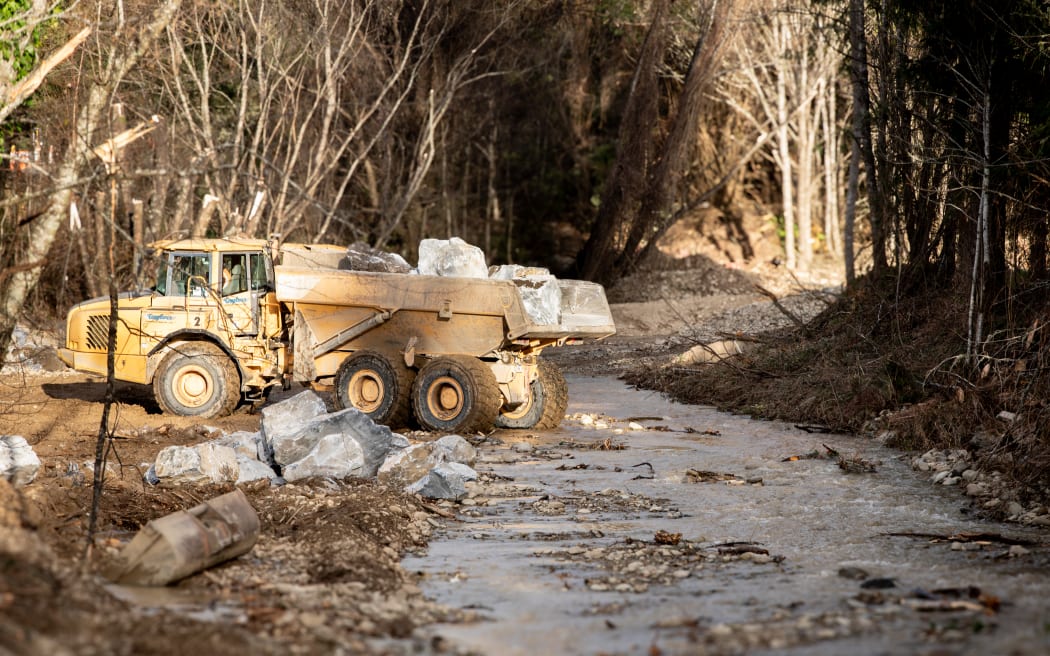 Crews are cleaning up and preparing for more rain near State Highway 6 near Kohatu.