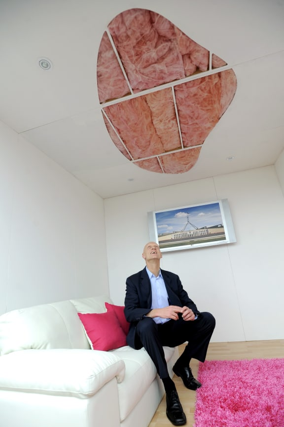 Peter Garrett at the start of the insulation scheme.