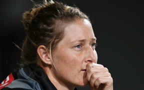 White Ferns captain Sophie Devine looks on.