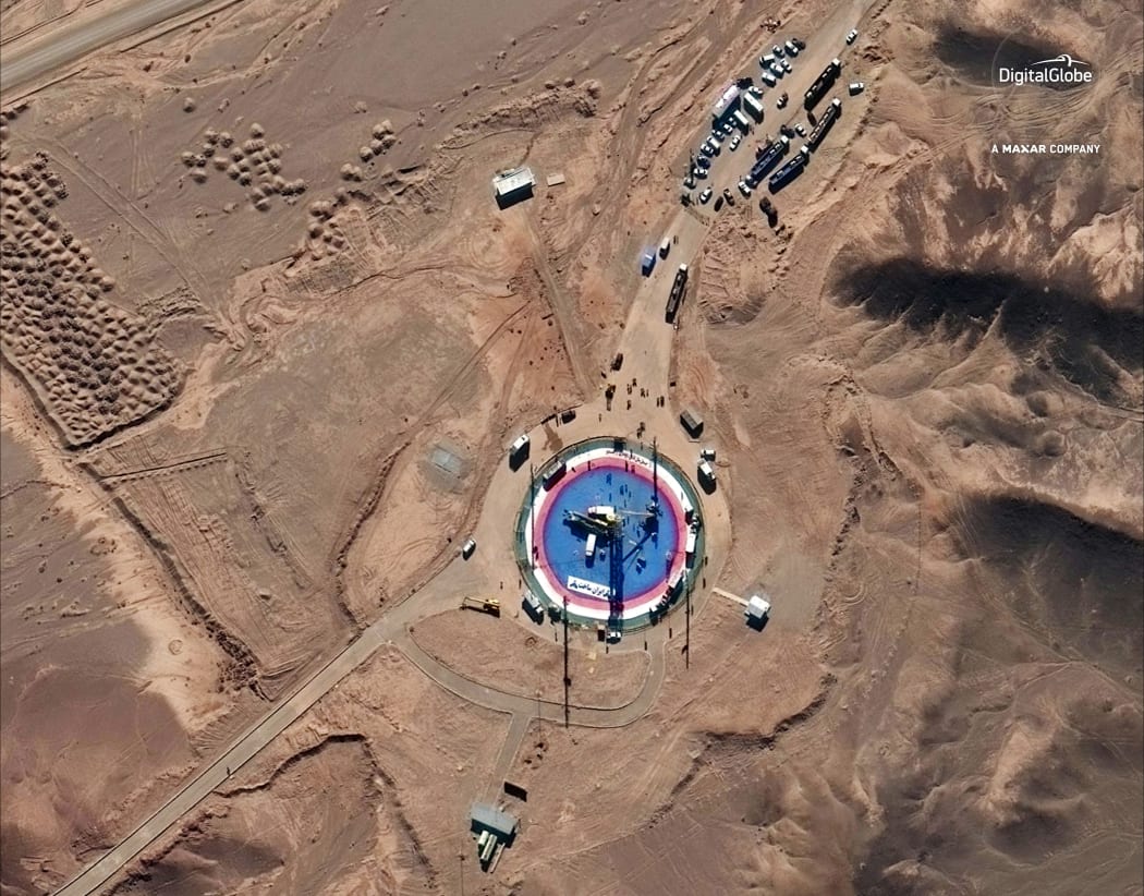 This Feb. 5, 2019, satellite image provided by DigitalGlobeÂ shows a missile on a launch pad and activity at the Imam Khomeini Space Center in Iran's Semnan province.