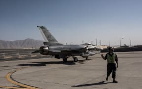BAGRAM, AFGHANISTAN - SEPTEMBER 5: An American F-16 fighter jet taxis down a runway at Bagram Air Field on September 5, 2017 in Bagram, Afghanistan.