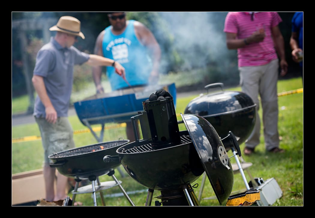 Photo of people BBQing at Braai Day