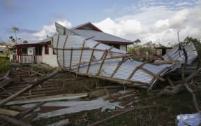 The roof of Feleti‘s shop has blown off.