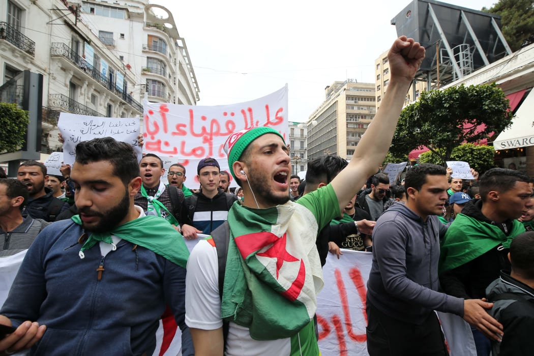 Algerian students demonstrate with national flags in the center of the capital, Algiers in Algeria on March 26, 2019, against the extension of the mandate of President Abdelaziz Bouteflika and demanding an immediate change.