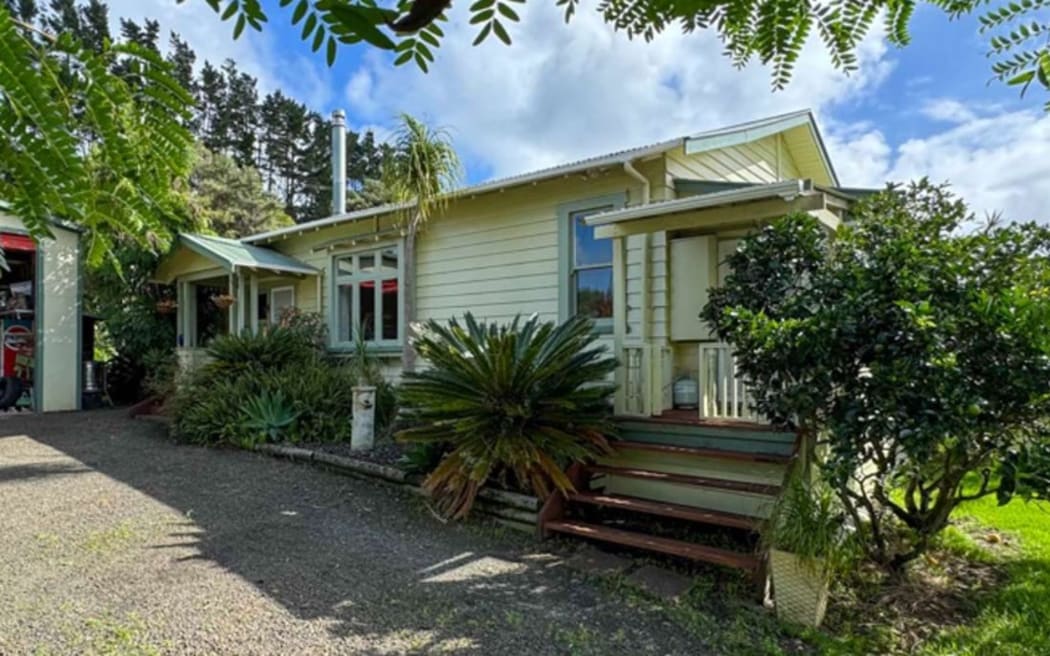 This three-bedroom house in Helensville is advertised at inquiries over $950,000, just below the median Rodney price.