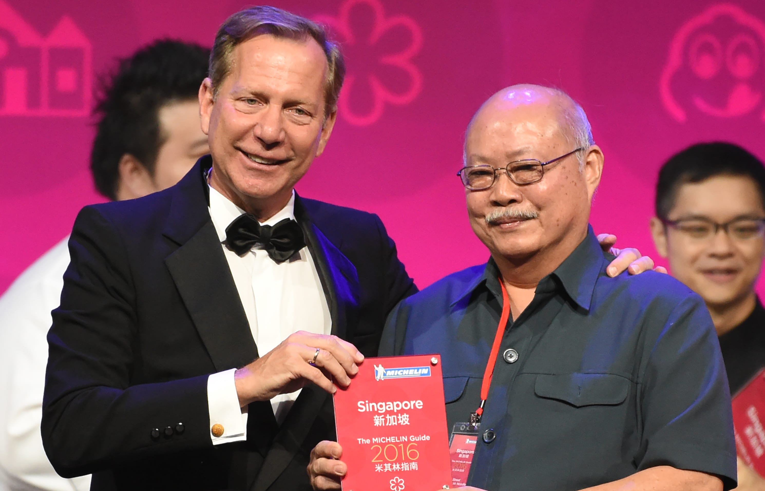 Michelin Guides international director Michael Ellis presents the award to Tang Chay Seng of Hill Street Tai Hwa Pork Noodle in Singapore on Thursday 21 July 2016.