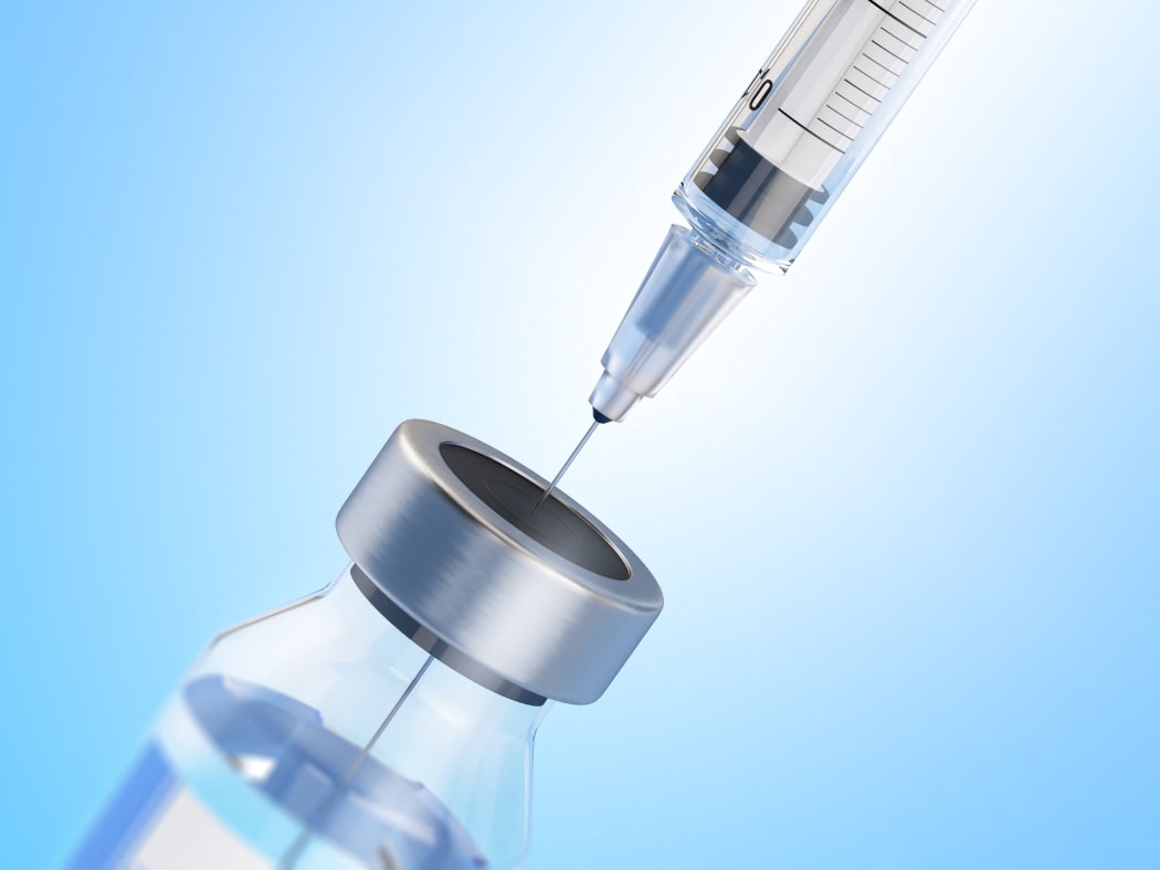 Syringe in phial, illustration. (Photo by SERGII IAREMENKO/SCIENCE PHOTO L / SIA / Science Photo Library via AFP)