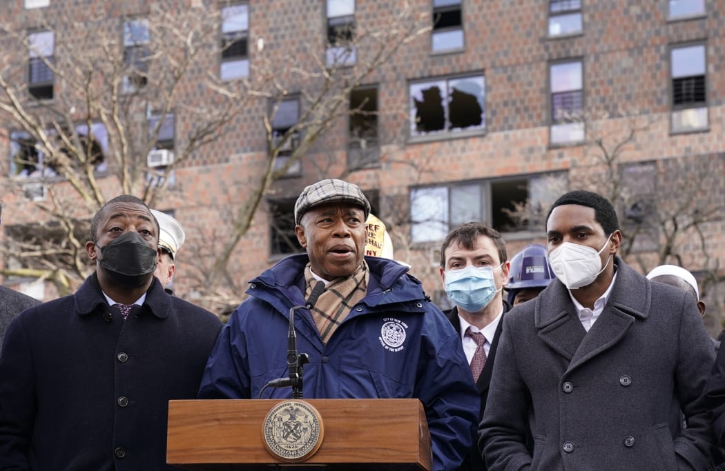 New York City Mayor Eric Adams holds a press conference January 10, 2022 outside the 120-unit apartment building in the Bronx that was the site of the fire yesterday.