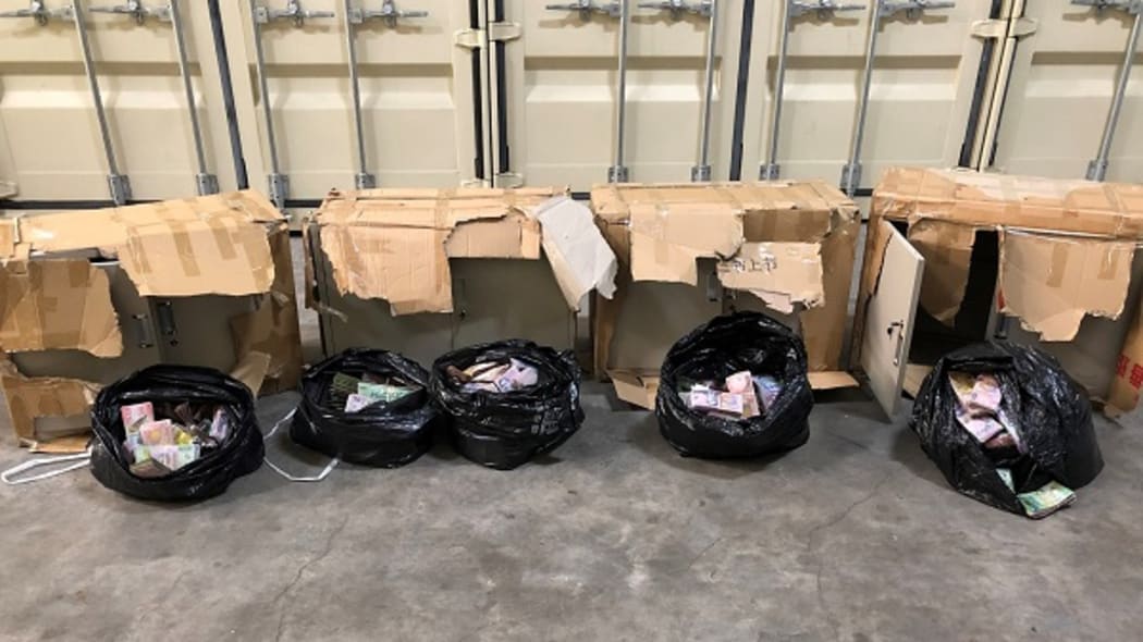 Some of the cash seized in the operation.