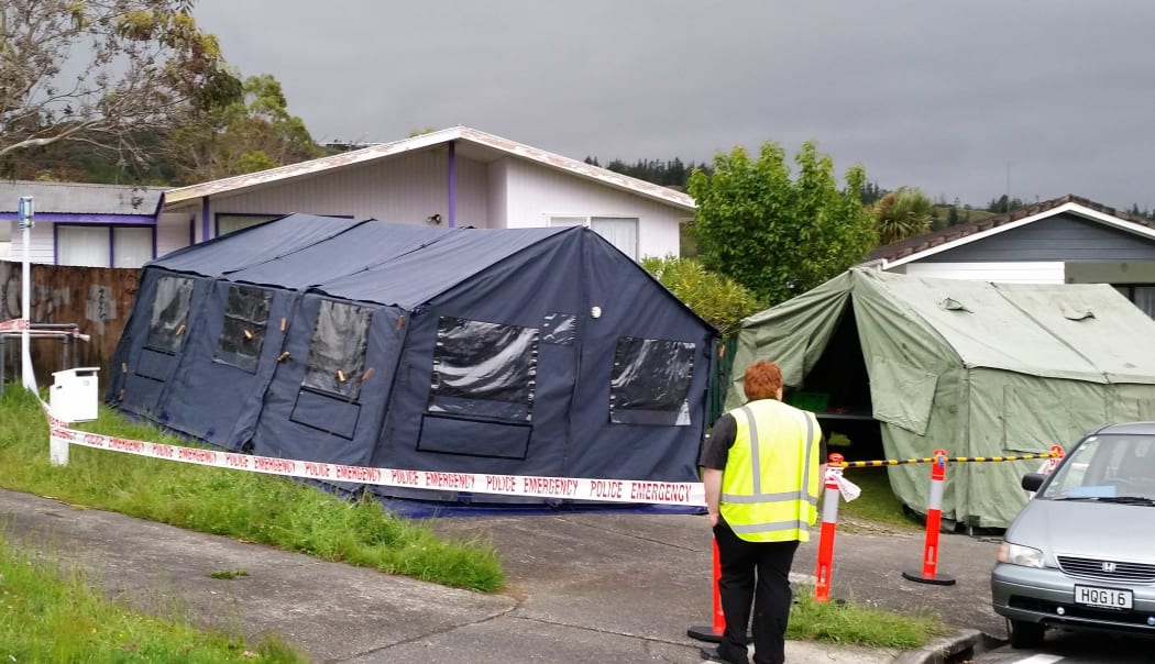 Police forensices tents errected at the axe attack address in Upper Hutt.